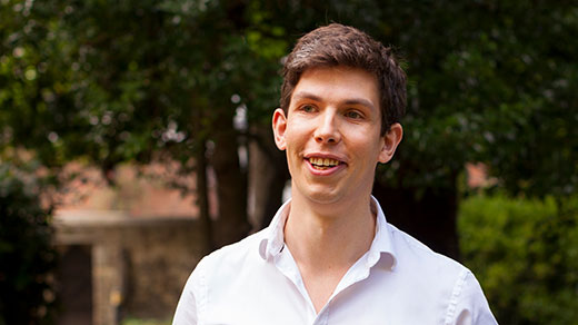 A photograph of the mathematician James Maynard outside his home in Oxford, England.